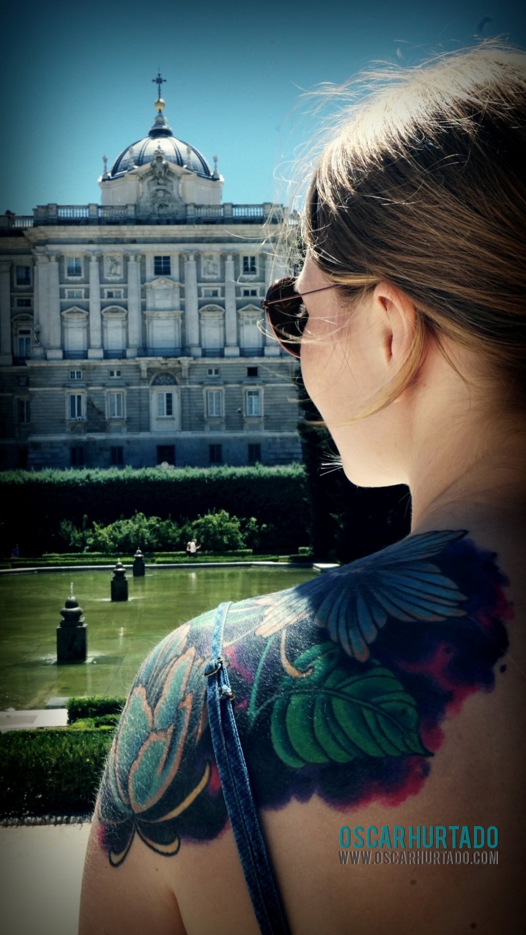 Anya looking at the beautiful Royal Palace of Madrid Spain