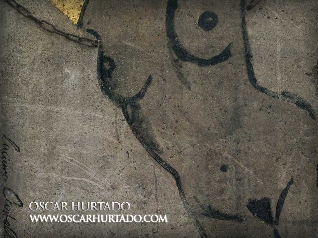 Street art exhibition portraying an erotic painting of a nude female body over a concrete surface