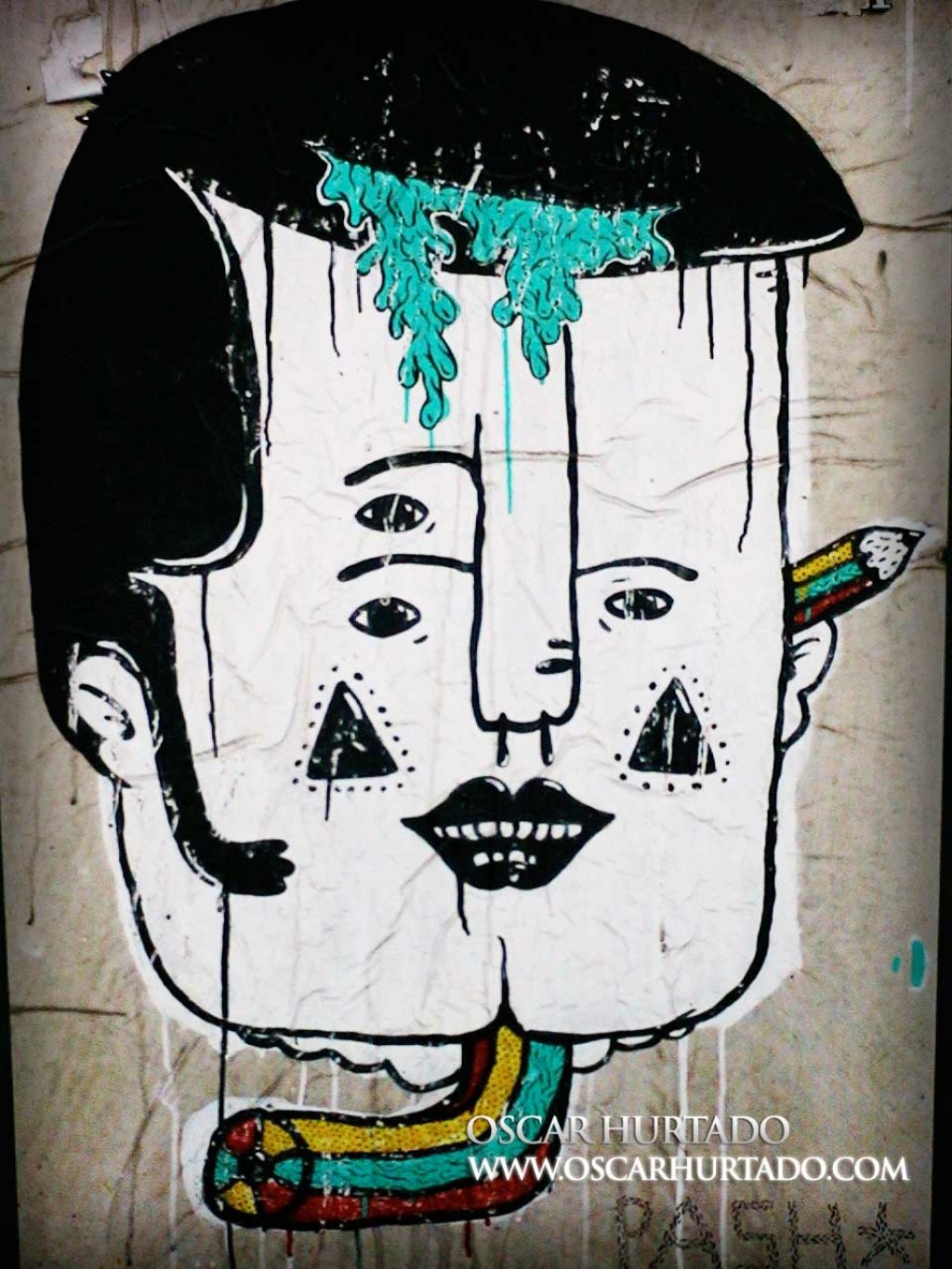 Colorful graffiti sticker portraying the face of a man with different surreal features such as three eyes and a bending tricolor pencil as neck