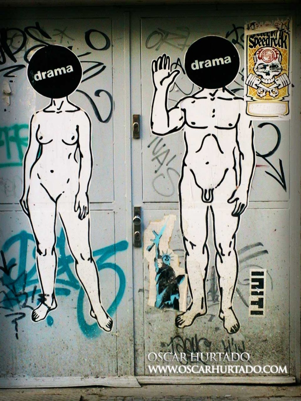 Graffiti stickers portraying male and female nudes with black filled circles titled Drama as heads