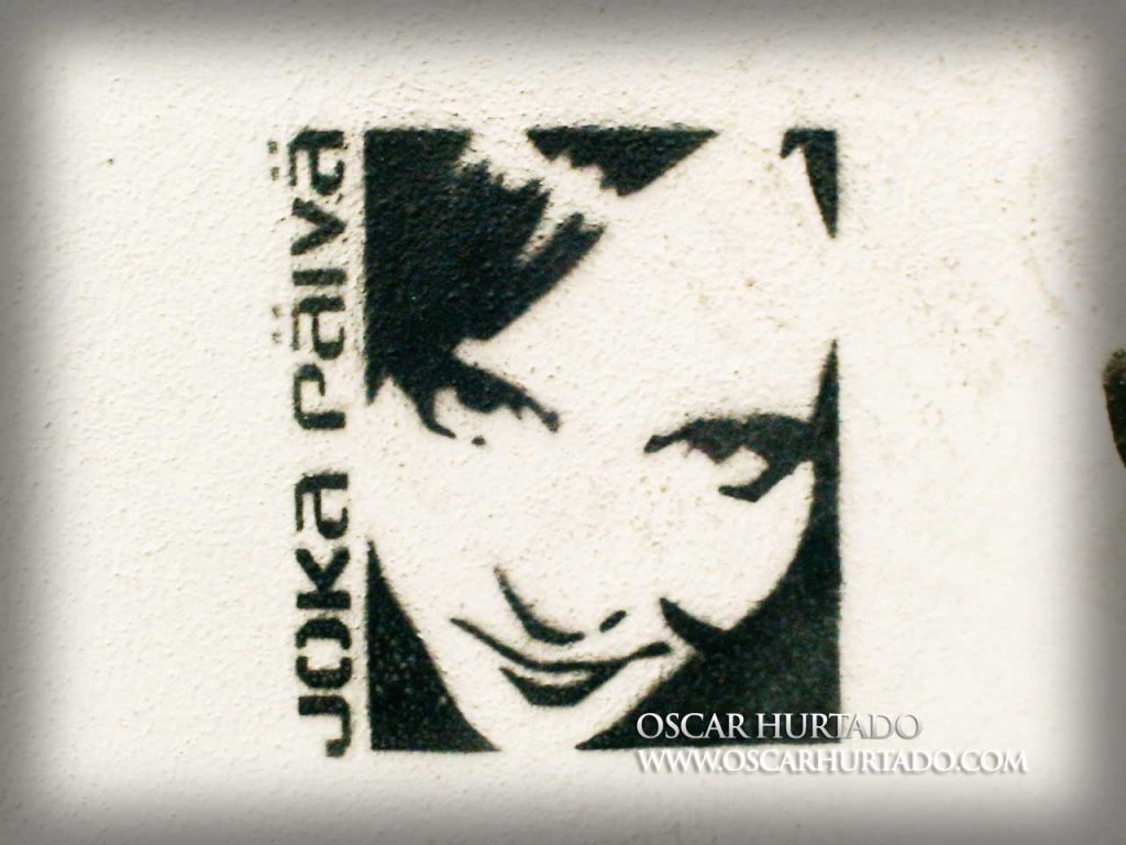 Black minimalistic stencil graffiti by Joka PÃ¤ivÃ¤ of a portrait of a girl