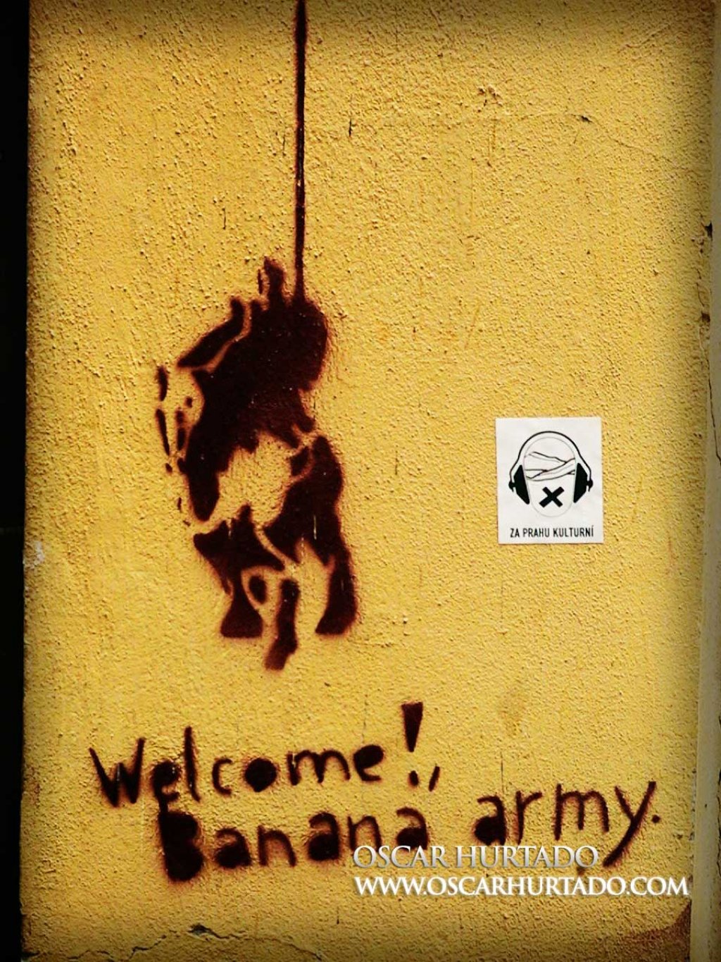 Graffiti portraying Don Quixote and the Banana Army sign
