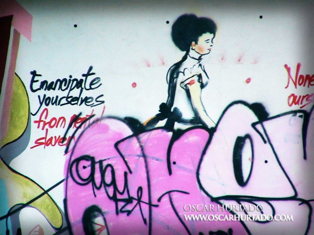 Victorian style lady portrayed in a graffiti covered by multiple messages