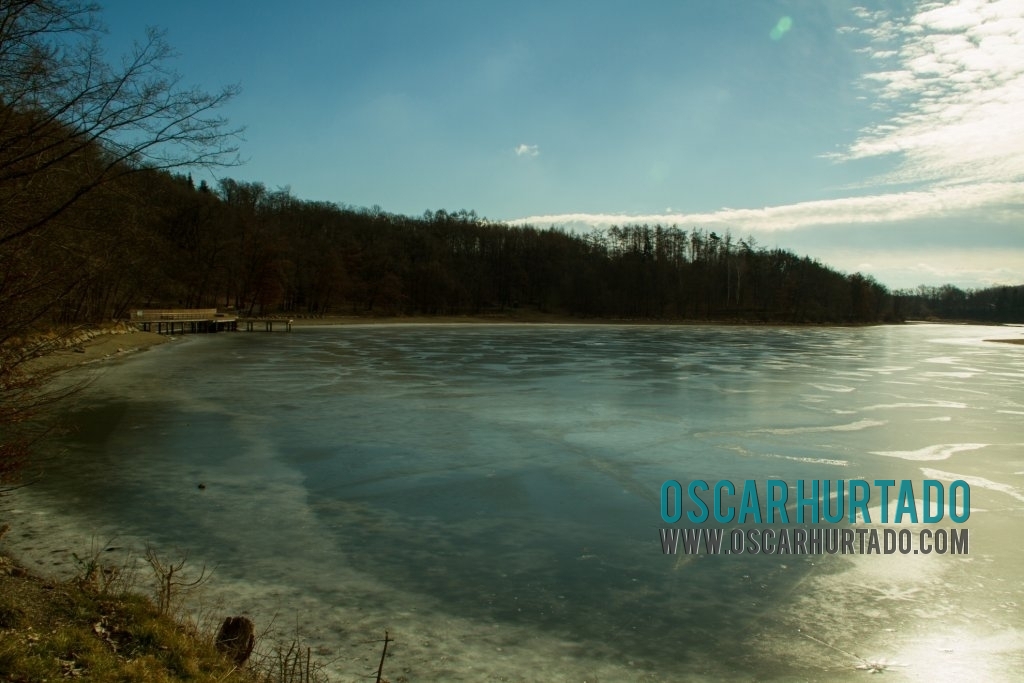 A beautiful wide view of a frozen lake in the outskirts of Prague