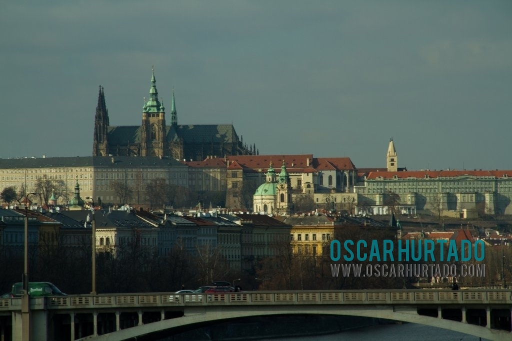 The iconic Prague Castle seen from a distance during a sunny winter afternoon