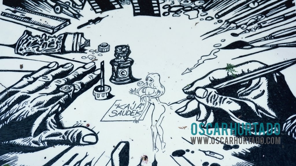 The beautifully illustrated tombstone on the grave of famous Czech artist Kaja Saudek