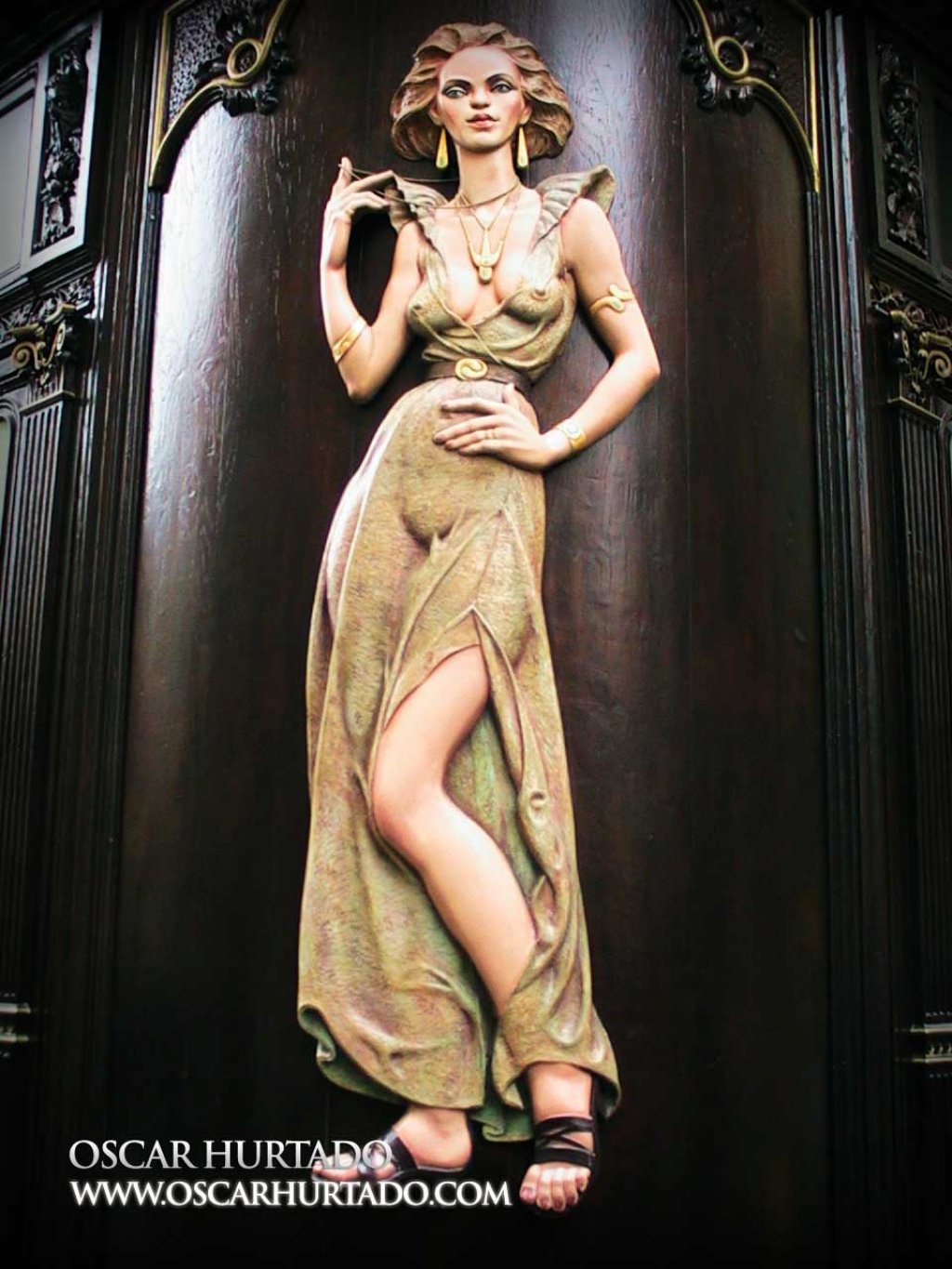 The iconic and beautiful wooden carved woman found on the façade of the Cafe-Restaurant Prague