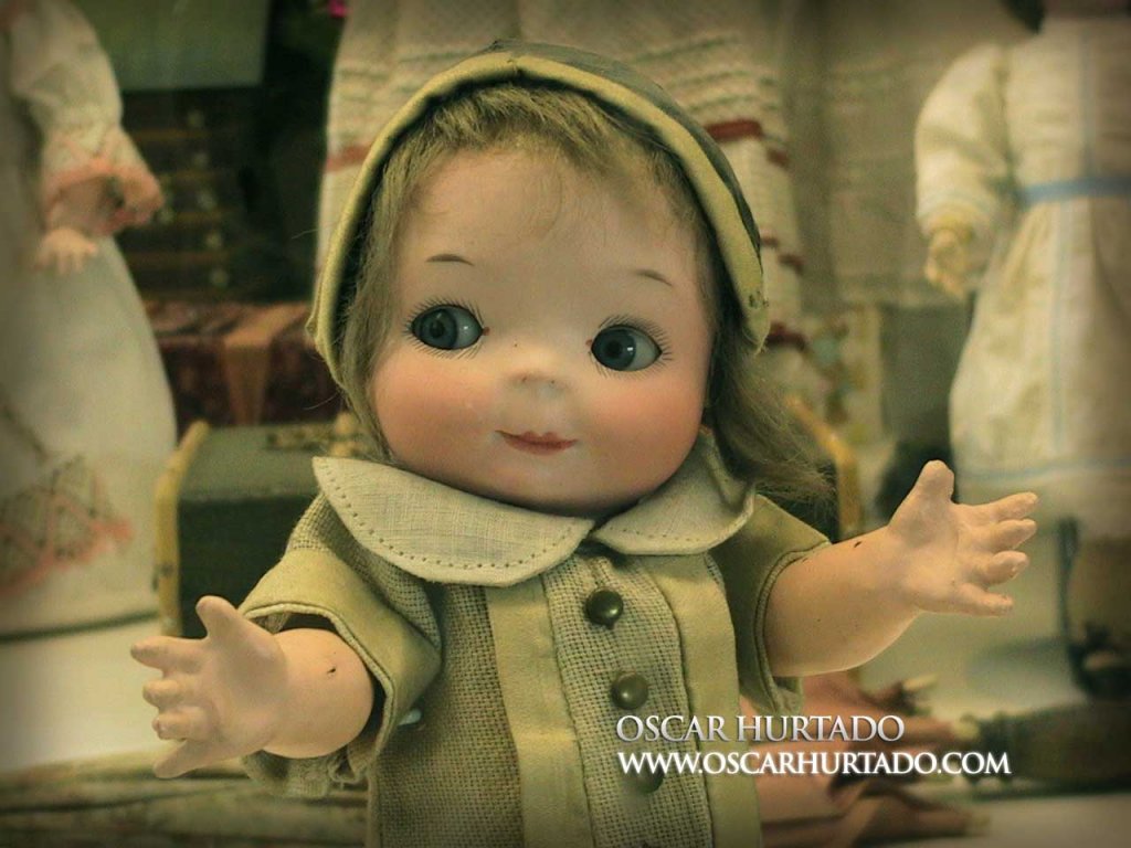 Medium closeup of a beautiful and cute antique doll found in the Toy Museum of Prague