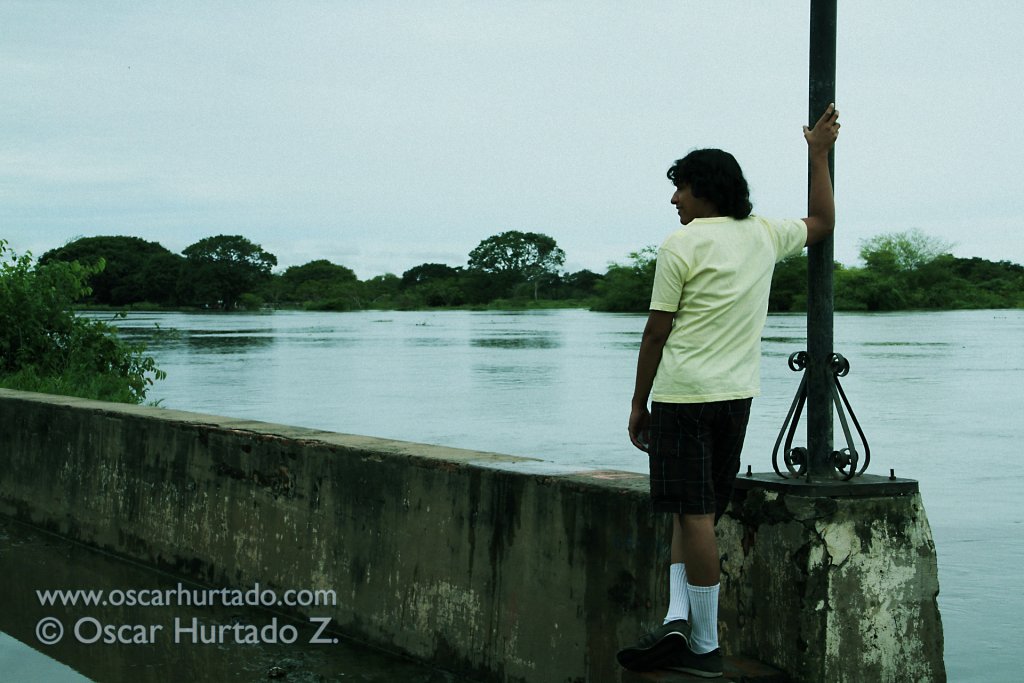 My brother takes some time to contemplate the magical flooded landscape of the Magdalena river during one rainy afternoon in Mompox