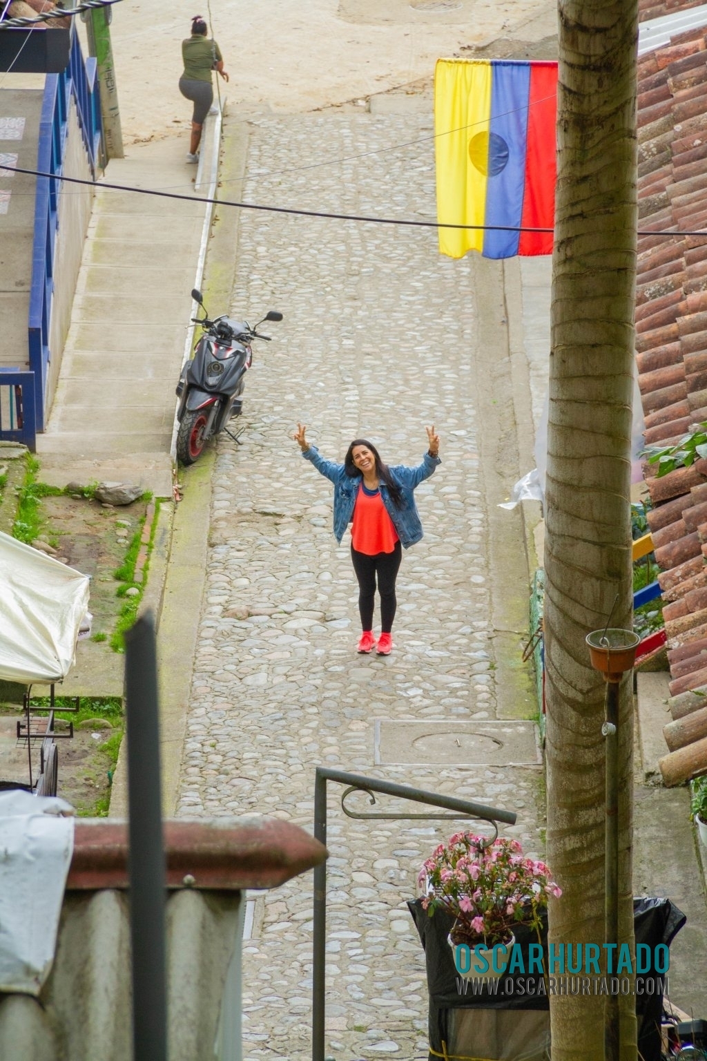 A far away perspective of my sister goofing around the streets of Salento, Quindío